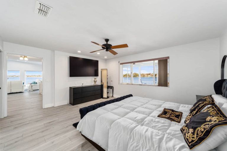 Second king bedroom with television and water view