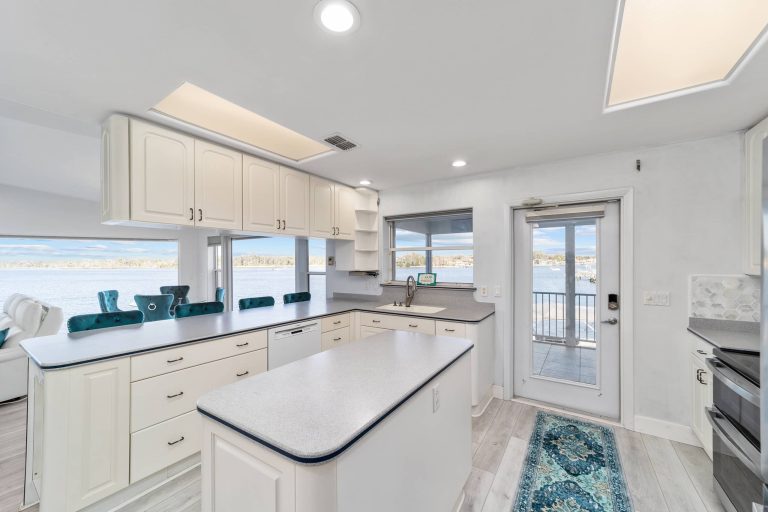 Full kitchen with island and river views