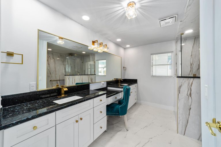 Primary bathroom with dual vanity and walk-in shower
