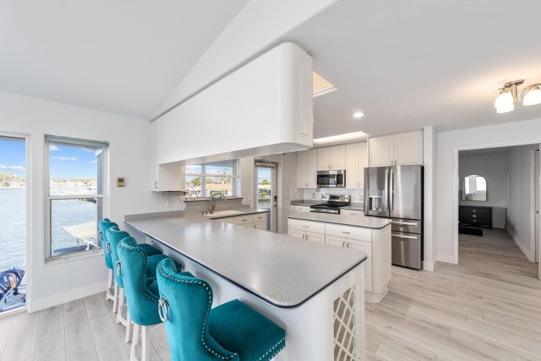 Large kitchen island and waterfront windows