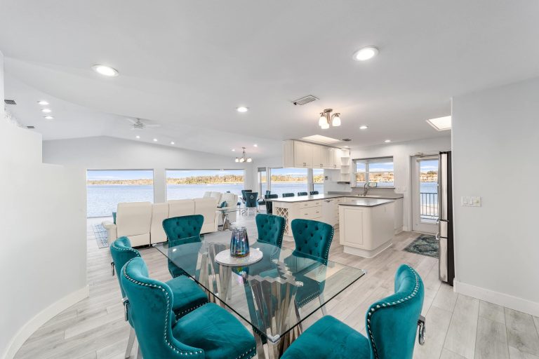 Dining table between the kitchen and living room
